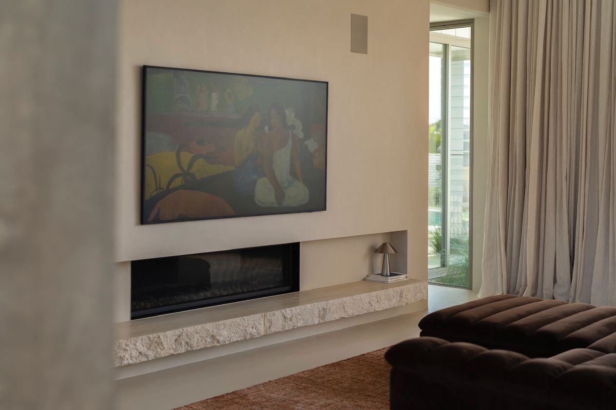Living room with gas fireplace and stone hearth — House on Pacific